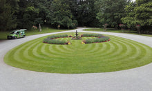 Unique mowing patterns on a healty lawn treated by the GreenThumb Chepstow team