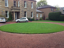 lush circle lawn treated by GreenThumb Edinburgh