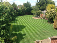 large striped lawn treated by GreenThumb Birmingham South West, Dudley & Great Malvern