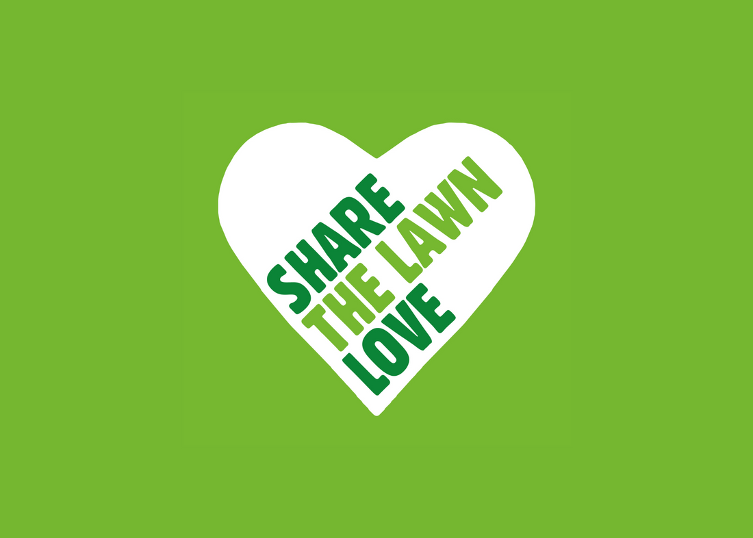 White heart on green background with share the lawn love text
