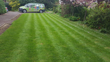 GreenThumb Lincoln striped green lawn and van