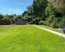 Large lush lawn treated by GreenThumb Epsom