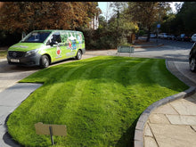 A GreenThumb Van parked beside a lush lawn treated by GreenThumb Croydon and Bromley