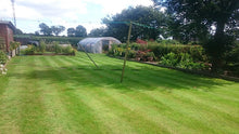 lush green lawn with stripes treated by GreenThumb Wrecsam