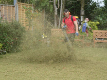 Picture of GreenThumb Chigwell James treating a lawn 