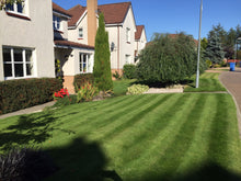 beautiful front lawn with stripes treated by GreenThumb Falkirk