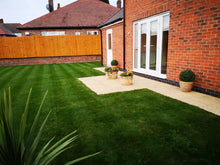 A vibrant green lawn treated by GreenThumb Ashby