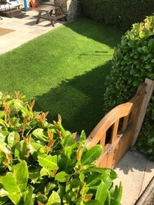 small lawn with bench treated by GreenThumb Wharfedale