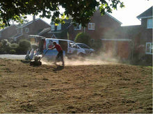 Customers lawn during treatment by the team at GreenThumb Shropshire