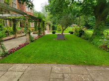 A beautiful garden with theh lawn treated by GreenThumb Birmingham North