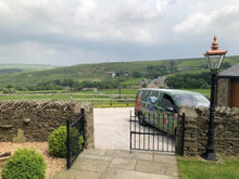 GreenThumb Burnley Van parked outside a house with rural views